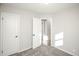 Bright bedroom with neutral walls and carpet at 1716 Moline St, Aurora, CO 80010