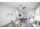 Cozy living room featuring a gray sofa, armchairs, and a coffee table at 1716 Moline St, Aurora, CO 80010