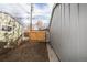 Side yard with wooden fence and gate at 1716 Moline St, Aurora, CO 80010