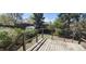 The back deck overlooks the beautiful backyard space at 8389 Benton Way, Arvada, CO 80003
