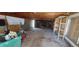Unfinished basement space with exposed ceiling and storage at 8389 Benton Way, Arvada, CO 80003