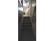 View of basement stairs at 8389 Benton Way, Arvada, CO 80003