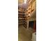 Basement with shelving, storage space, and low ceilings at 8389 Benton Way, Arvada, CO 80003
