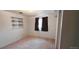 Bedroom with neutral paint, carpet, and bright window at 8389 Benton Way, Arvada, CO 80003