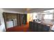 Living room showcasing laundry area, mechanical closet, sofas and a window at 8389 Benton Way, Arvada, CO 80003