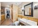 Bathroom with sleek vanity, mosaic tiled shower, and luxurious finishes create a spa-like experience at 2500 Walnut St # 201, Denver, CO 80205