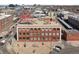 Aerial view of the Benjamin Moore Paints building with brick facade and many windows at 2500 Walnut St # 201, Denver, CO 80205