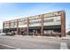 Street-level view of the Denver Central Market building with its many windows at 2500 Walnut St # 201, Denver, CO 80205