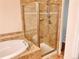 Spa-like bathroom with glass enclosed shower and soaking tub, perfect for relaxation and rejuvenation at 9238 Viaggio Way, Highlands Ranch, CO 80126