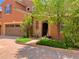 Charming two-story home with a welcoming front entrance and a well-manicured lawn and a two car garage at 9238 Viaggio Way, Highlands Ranch, CO 80126