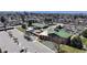 Scenic aerial of a red-brick building with a green roof surrounded by parking at 110 Forest St, Denver, CO 80220