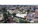 Backyard with deck overlooking a neighborhood, lush greenery, and mature trees at 110 Forest St, Denver, CO 80220
