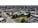 Aerial view of a brick building with distinct architecture and green roofing at 110 Forest St, Denver, CO 80220
