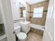 Beautifully tiled bathroom with modern sink vanity and a bathtub shower combination at 437 S Fetzer St, Byers, CO 80103