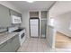 Efficient kitchen with appliances, granite counters, lots of cabinet space, and a breakfast bar at 437 S Fetzer St, Byers, CO 80103