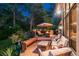 Outdoor deck with fire pit, grill, garden, and inviting lounge seating and dining at 5063 E Otero Cir, Centennial, CO 80122