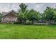 A grassy lawn and small shrubs accentuate the community building, creating an inviting outdoor space at 5063 E Otero Cir, Centennial, CO 80122
