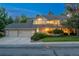 Charming two-story home boasting a three-car garage and beautiful landscaping, perfect for suburban living at 5063 E Otero Cir, Centennial, CO 80122