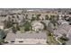Aerial view of a residential area featuring well maintained townhomes, garage parking and mature trees at 10183 Grove Loop # D, Westminster, CO 80031