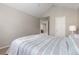 Comfortable bedroom with carpet, ample natural light, and a serene ambiance for restful nights at 10183 Grove Loop # D, Westminster, CO 80031