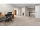Spacious bonus room with carpet and natural light, great for a home office or recreation area at 10183 Grove Loop # D, Westminster, CO 80031