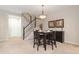 Dining area featuring a view of the staircase at 10183 Grove Loop # D, Westminster, CO 80031
