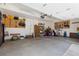 Spacious two car garage with ample storage space, pegboards, and garage door opener for easy access at 10183 Grove Loop # D, Westminster, CO 80031