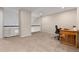 Upstairs loft area perfect for a home office with natural light and railing overlooking the living area at 10183 Grove Loop # D, Westminster, CO 80031