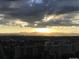 Scenic sunset over the mountains and city at 300 W 11Th Ave # 18C, Denver, CO 80204