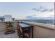 Private balcony with city views and space for seating at 300 W 11Th Ave # 18C, Denver, CO 80204