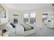 Bright bedroom with city views and sitting area at 300 W 11Th Ave # 18C, Denver, CO 80204