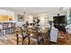Open dining area with hardwood floors and seating for four at 300 W 11Th Ave # 18C, Denver, CO 80204