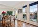 Charming dining room with hardwood floors and access to a patio at 300 W 11Th Ave # 18C, Denver, CO 80204