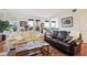 Elegant living room featuring hardwood floors and comfortable sofas at 300 W 11Th Ave # 18C, Denver, CO 80204