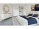 Bright and airy main bedroom with plush bedding and modern decor at 300 W 11Th Ave # 18C, Denver, CO 80204