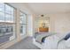 Spacious main bedroom featuring large windows and an ensuite bath for a spa-like experience at 300 W 11Th Ave # 18C, Denver, CO 80204