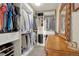 Large walk-in closet with ample shelving and hanging space at 300 W 11Th Ave # 18C, Denver, CO 80204