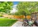 Relaxing backyard retreat with stone patio and comfortable lounge chairs at 12000 Horseshoe Ln, Parker, CO 80138