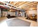 Spacious unfinished basement provides potential for customization and added living space at 12000 Horseshoe Ln, Parker, CO 80138