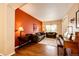 Inviting living room with hardwood floors, comfortable seating and a warm and inviting atmosphere at 12000 Horseshoe Ln, Parker, CO 80138