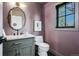 Stylish powder room featuring a modern vanity, elegant mirror, and a fresh color scheme, creating a welcoming and sophisticated space at 5290 Nassau E Cir, Cherry Hills Village, CO 80113
