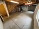 An unfinished basement with a concrete floor and exposed ceiling at 11304 Niagara St, Thornton, CO 80233