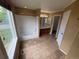 Bright bathroom featuring double sinks, tiled floors, and a shower-tub combo at 11304 Niagara St, Thornton, CO 80233