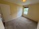 Neutral bedroom with carpeted floor, a window, and standard closet at 11304 Niagara St, Thornton, CO 80233