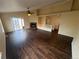 Spacious living room featuring hardwood floors, a fireplace, and sliding glass doors at 11304 Niagara St, Thornton, CO 80233