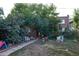 Spacious backyard with playset and pathway at 1620 Colorado Blvd # 6, Denver, CO 80220
