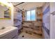 Updated bathroom with walk-in shower and modern vanity at 1620 Colorado Blvd # 6, Denver, CO 80220