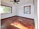 Spacious bedroom featuring hardwood floors and large windows at 1620 Colorado Blvd # 6, Denver, CO 80220