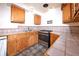 Kitchen with ample counter space and wood cabinets at 1620 Colorado Blvd # 6, Denver, CO 80220