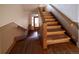 Wooden staircase leading to upper floors of the building at 1620 Colorado Blvd # 6, Denver, CO 80220